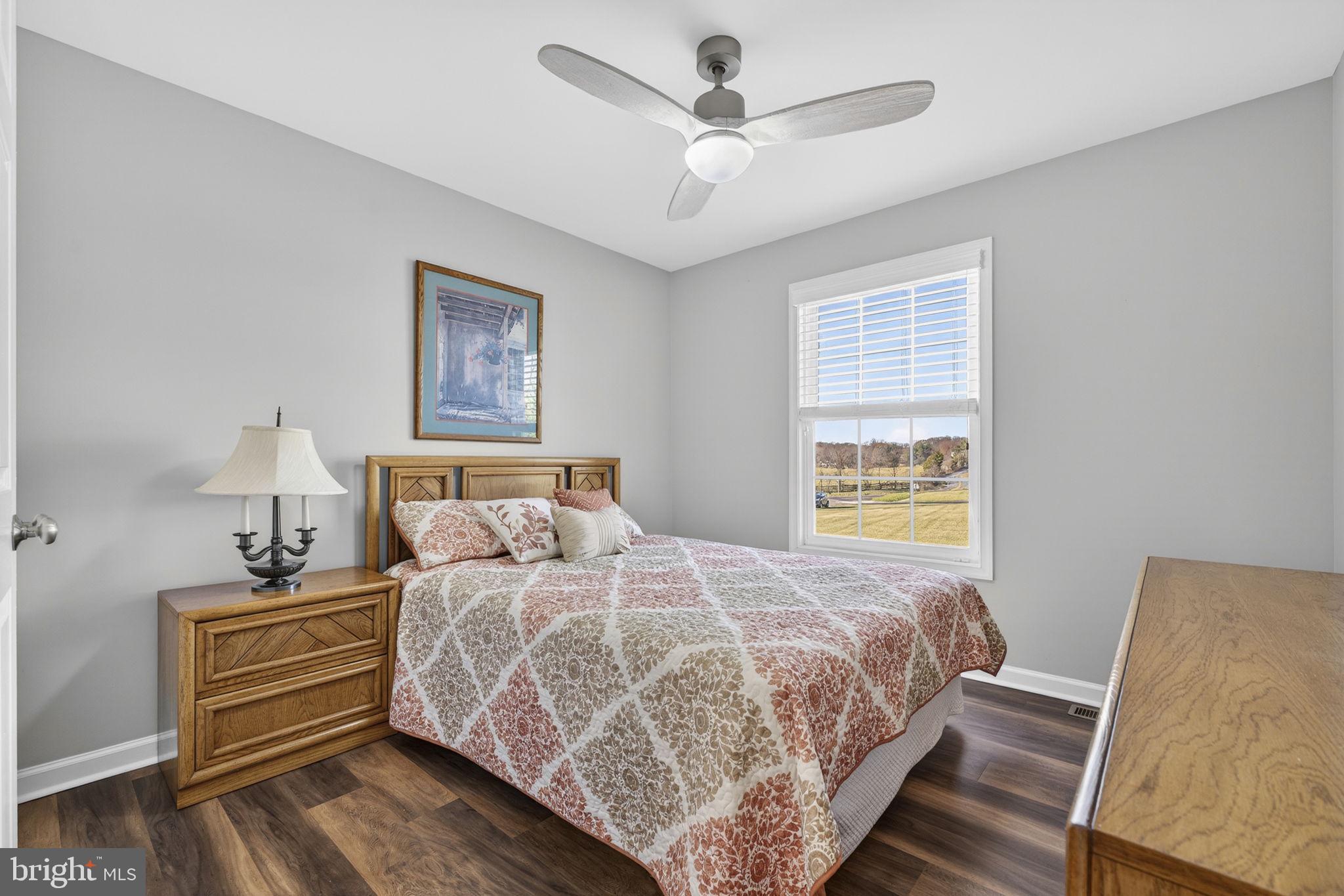 19707 Old Orange Road Culpeper, VA 22701 - Photo 19 of 40 a bedroom with a bed and a window