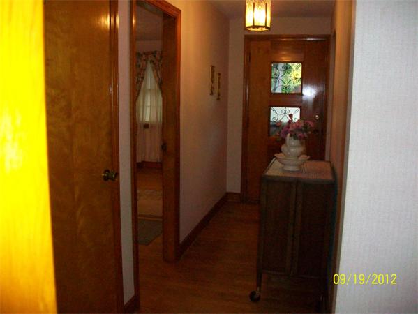 10 Senator Street Springfield, MA 01129 - Photo 17 of 21 a view of a hallway with wooden floor
