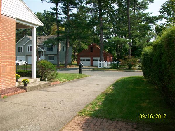 10 Senator Street Springfield, MA 01129 - Photo 6 of 21 a house with garden in front of it