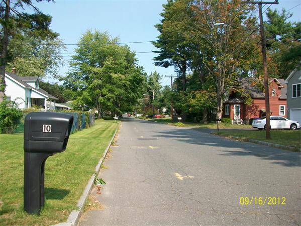 10 Senator Street Springfield, MA 01129 - Photo 7 of 21 a view of a street with a building and a street view