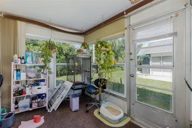 a room with furniture and a window