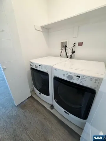 a view of a house with a swimming pool and a yard
