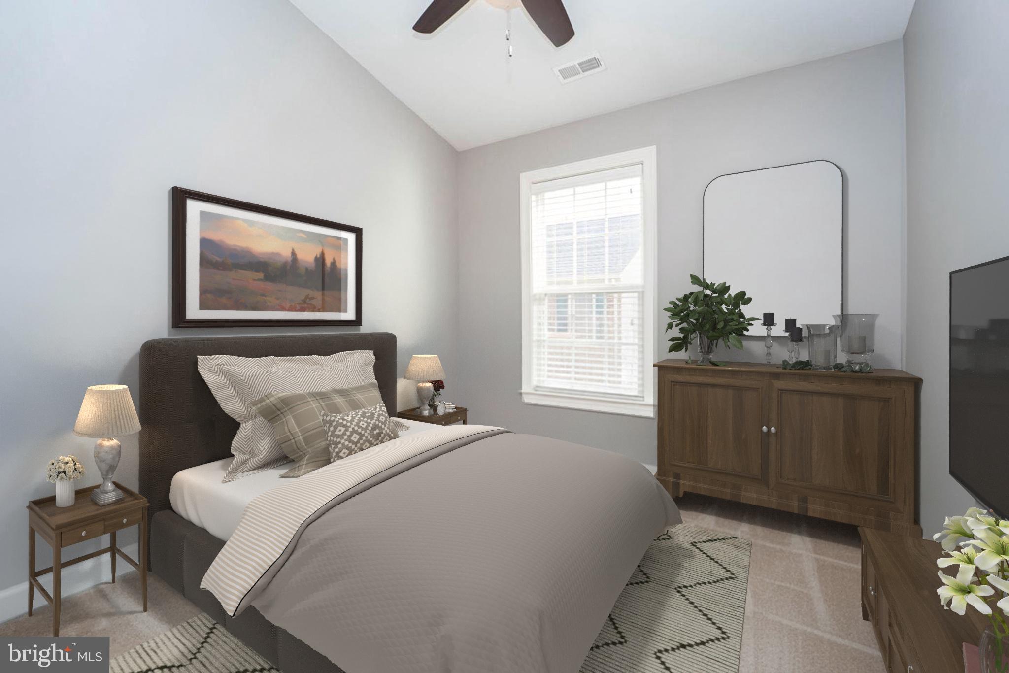 321 Bulwark Alley Annapolis, MD 21401 - Photo 40 of 58 a bedroom with a bed and window