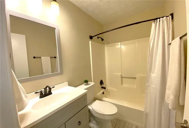 a view of a house with a big yard