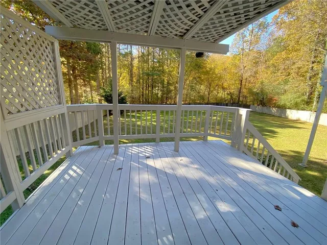 a view of a tree in a yard