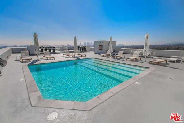 a view of a terrace with chairs