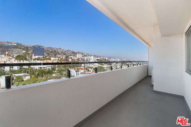 a view of a city skyline from a terrace