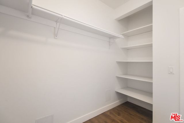 a view of an empty walk in closet