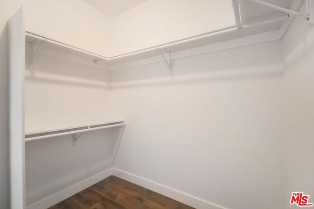 a bathroom with a sink a mirror and a bathtub