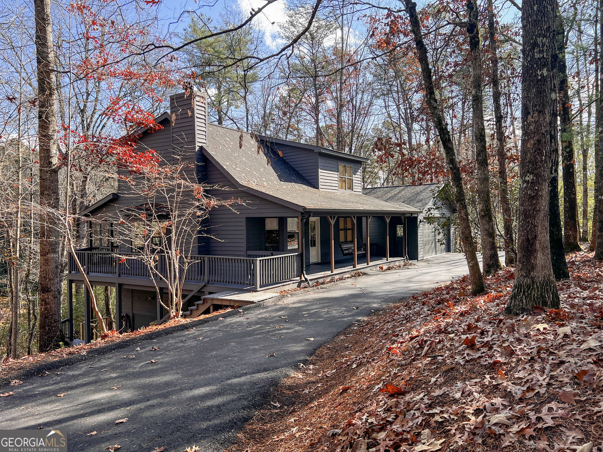 521 Northwind Sautee Nacoochee, GA 30571 - Photo 2 of 66 a front view of a house with a yard