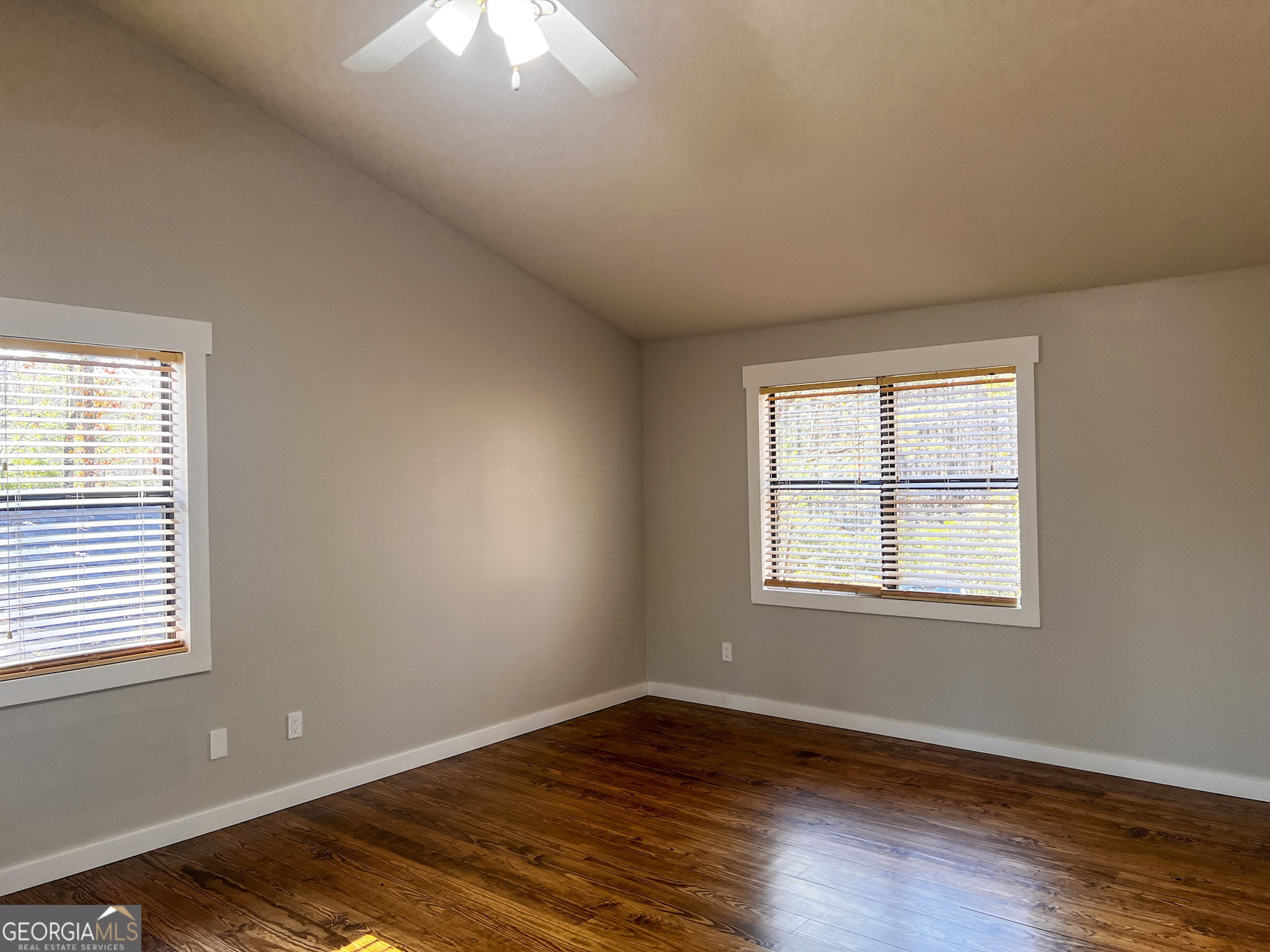 521 Northwind Sautee Nacoochee, GA 30571 - Photo 38 of 66 an empty room with wooden floor and windows