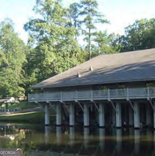 521 Northwind Sautee Nacoochee, GA 30571 - Photo 81 of 81 a backyard of a house with lake view and boat