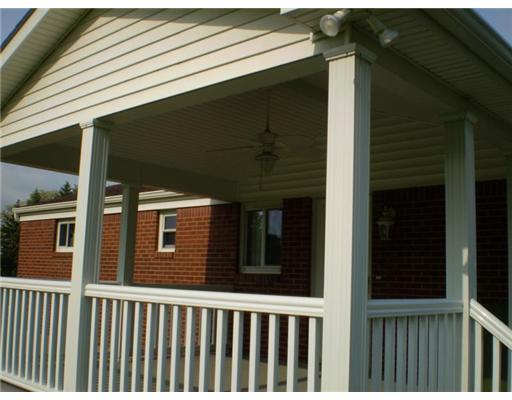 1080 Silver Lane McKees Rocks, PA 15136 - Photo 11 of 14 Patio/Deck. Enjoy the outdoors on the covered no-maintenance porch