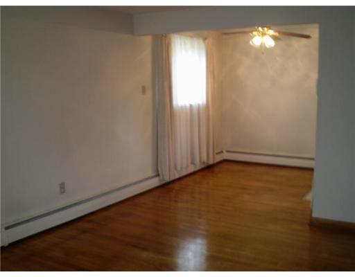1080 Silver Lane McKees Rocks, PA 15136 - Photo 5 of 14 Dining Room. Beautiful ceiling fan and hardwood in dining area