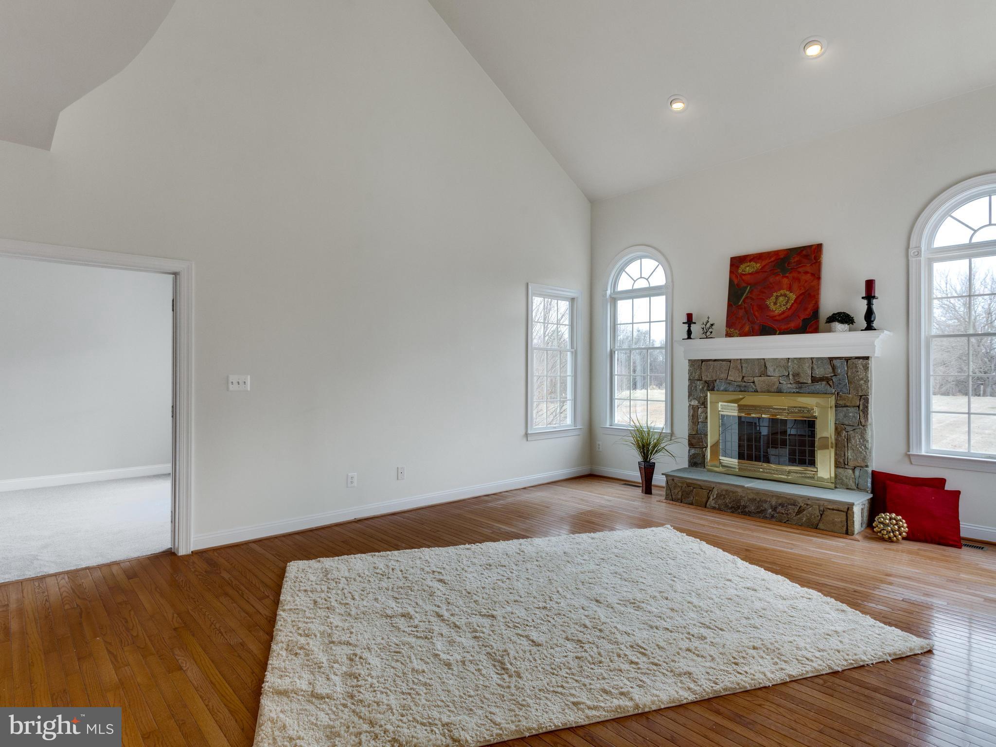 1704 Landon Hill Road Vienna, VA 22182 - Photo 7 of 30 Great Room Overlooks Yard and Opens to Study