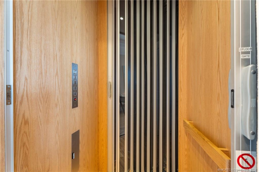 1560 Island Cove Road Fort Pierce, FL 34949 - Photo 15 of 41 Elevator travels to all 3 floors