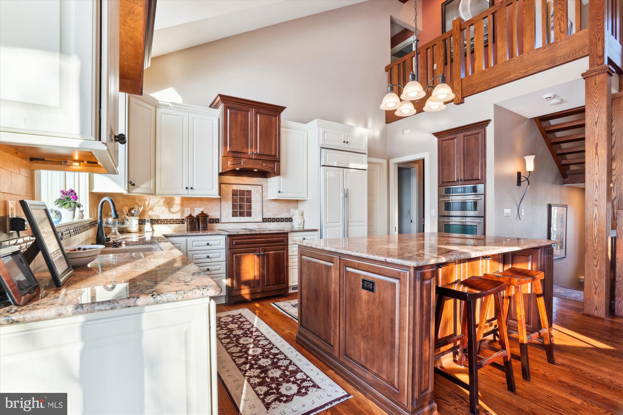 255 Long Point Road Crownsville, MD 21032 - Photo 20 of 67 a kitchen with stainless steel appliances granite countertop a stove and a refrigerator