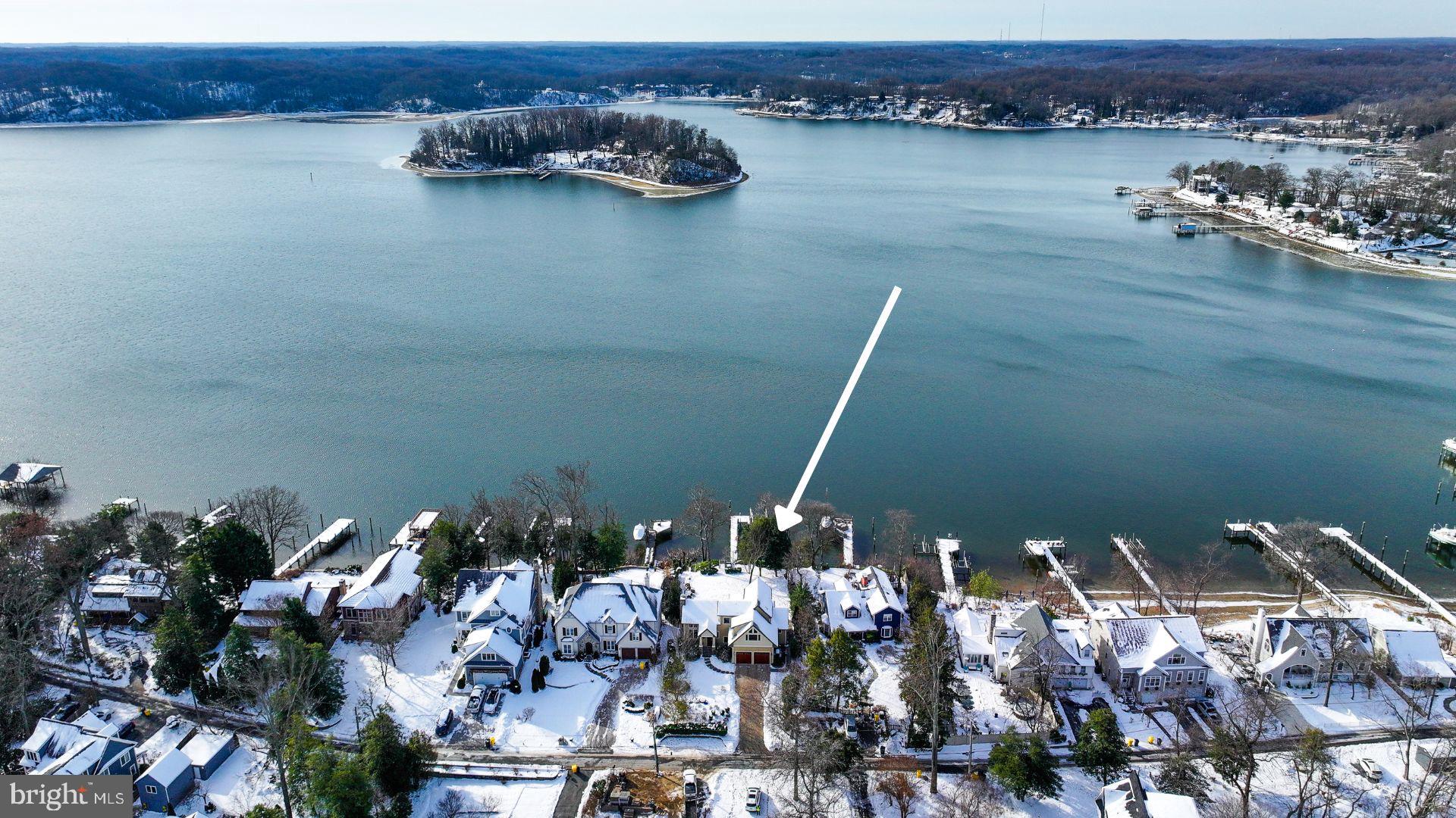 255 Long Point Road Crownsville, MD 21032 - Photo 3 of 67 a view of a lake with a mountain view