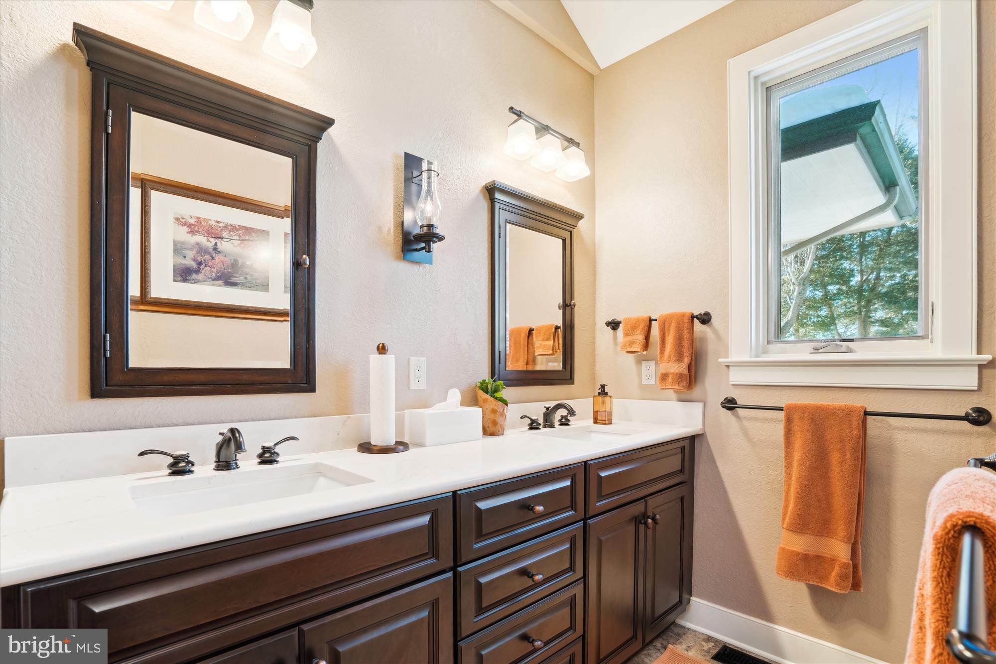 255 Long Point Road Crownsville, MD 21032 - Photo 33 of 67 a bathroom with a sink double vanity and a mirror