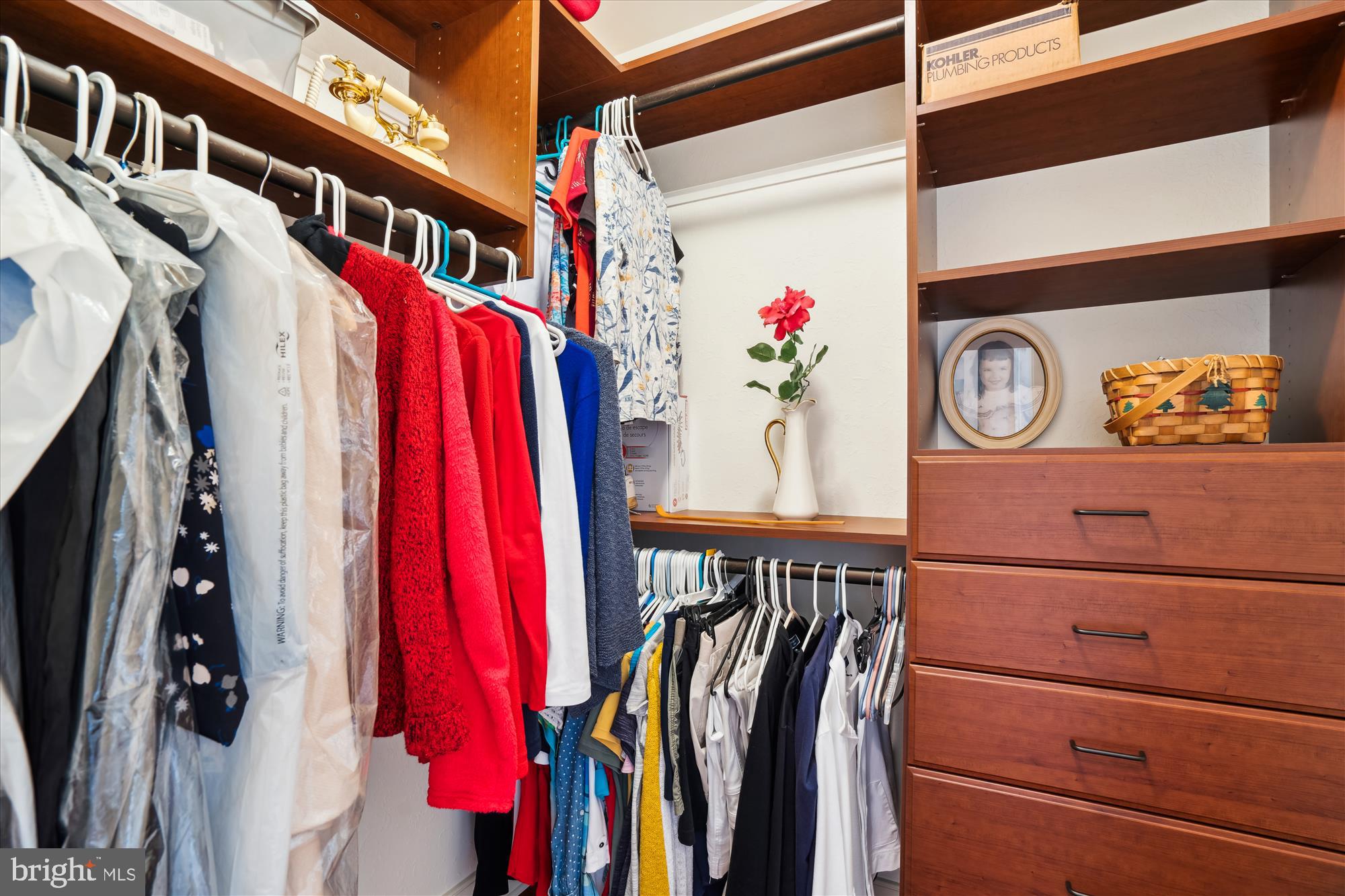 255 Long Point Road Crownsville, MD 21032 - Photo 37 of 67 a view of walk in closet with clothes and shoes