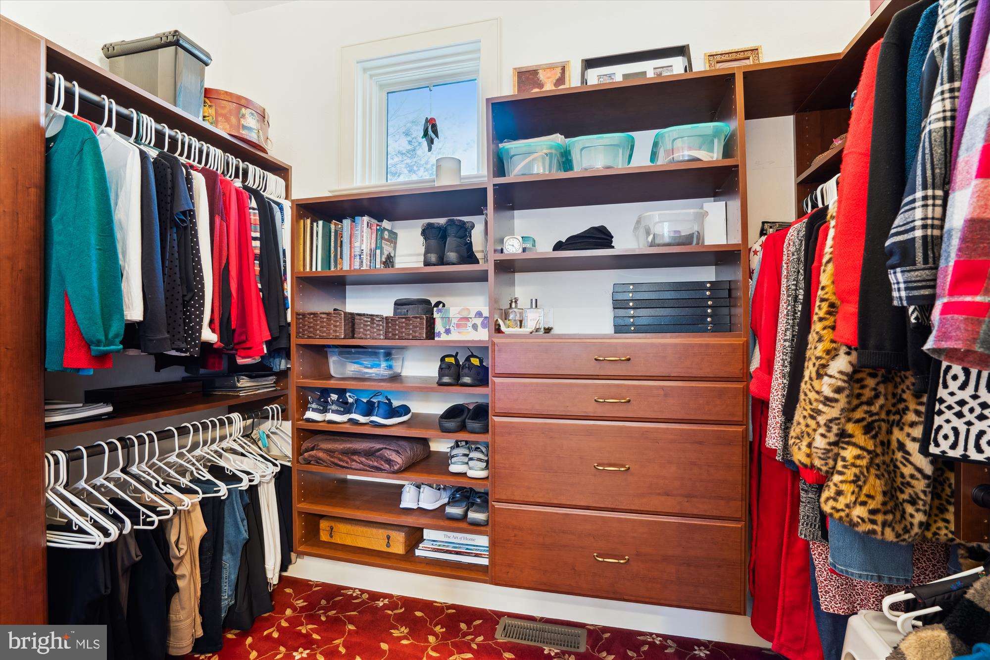 255 Long Point Road Crownsville, MD 21032 - Photo 38 of 67 a view of walk in closet with clothes and shoes