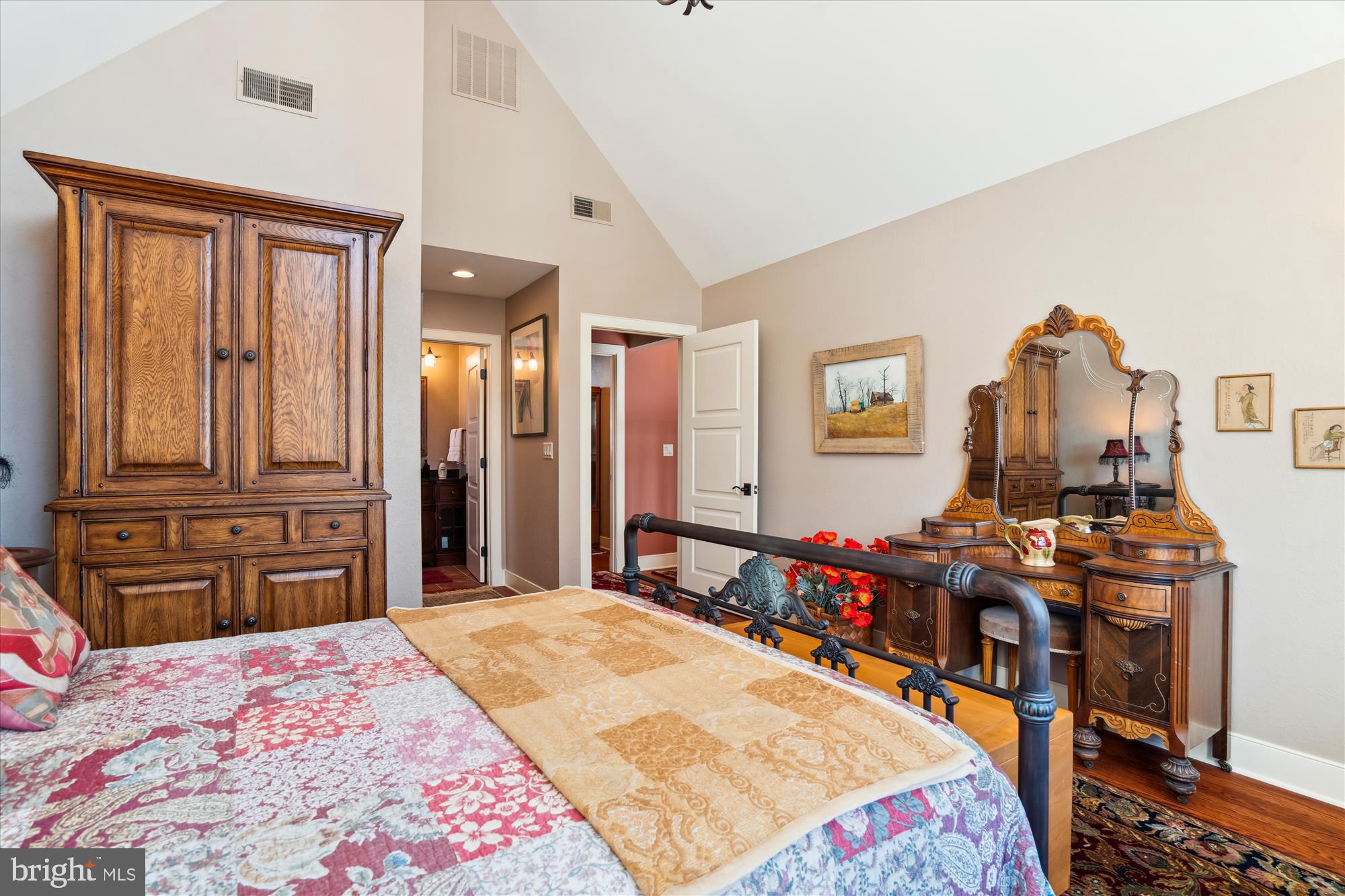 255 Long Point Road Crownsville, MD 21032 - Photo 43 of 67 a bedroom with a bed and wooden floor