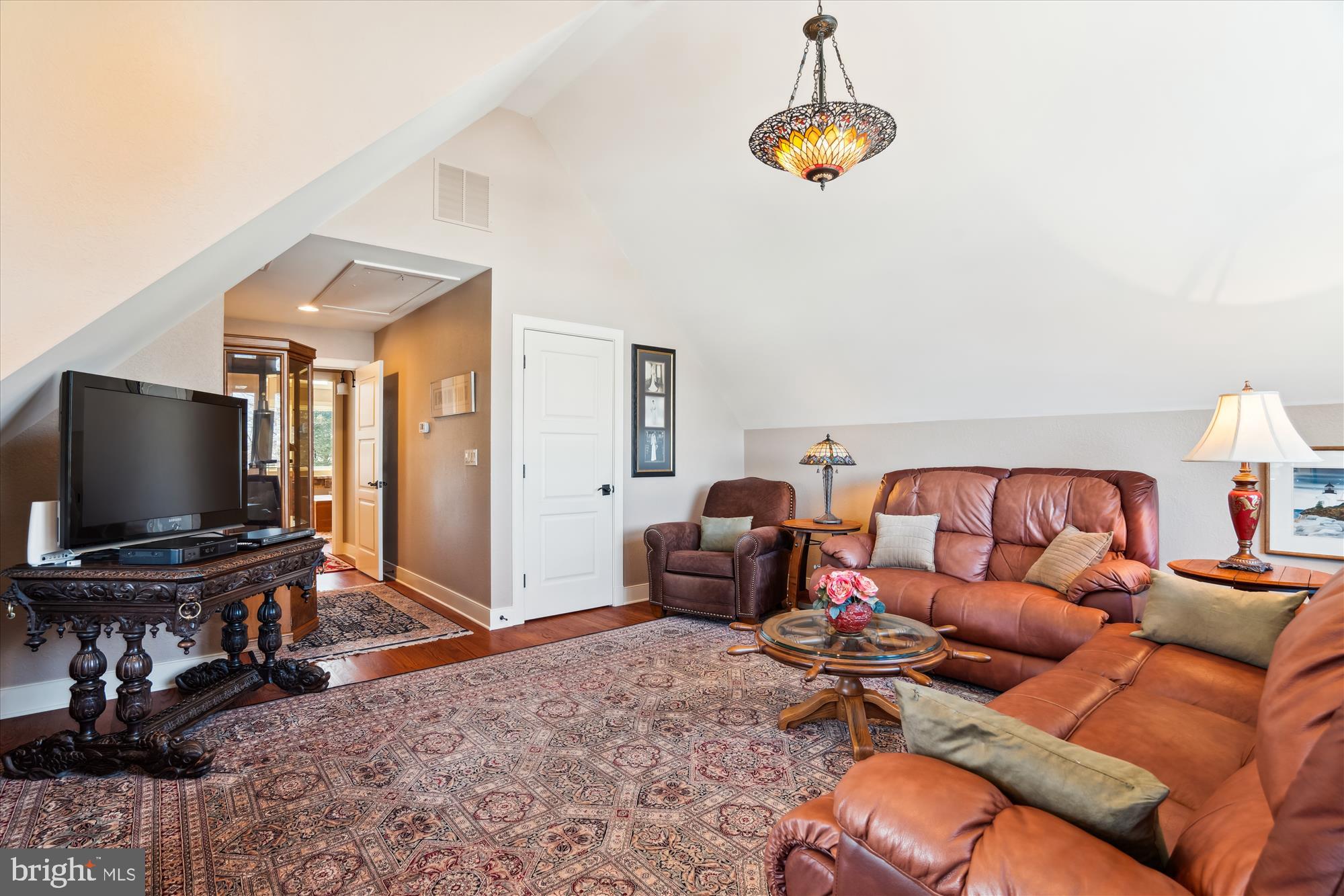 255 Long Point Road Crownsville, MD 21032 - Photo 49 of 67 a living room with furniture and a flat screen tv