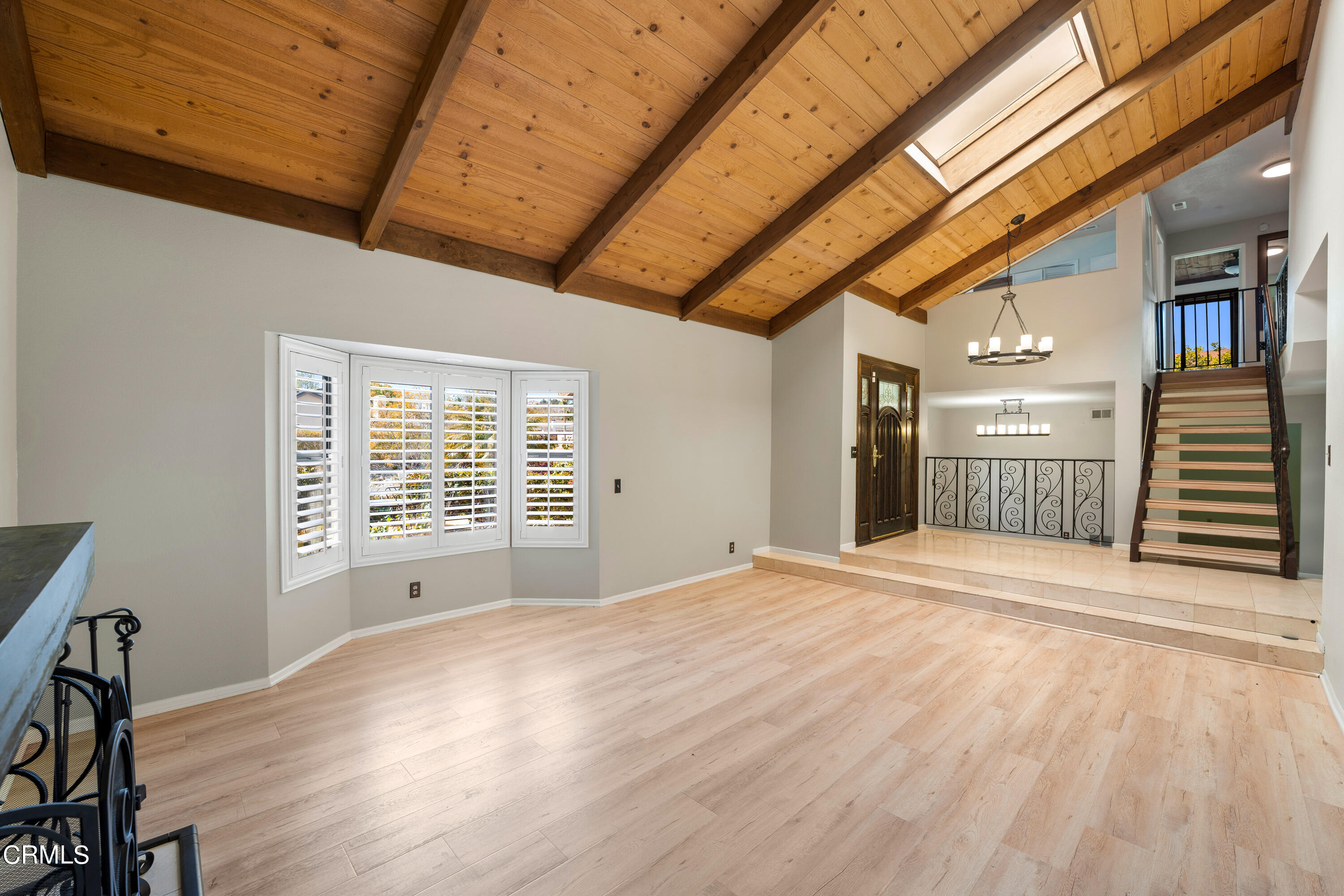 2210 Lyndhurst Avenue Camarillo, CA 93010 - Photo 11 of 37 a view of an empty room with a window and wooden floor