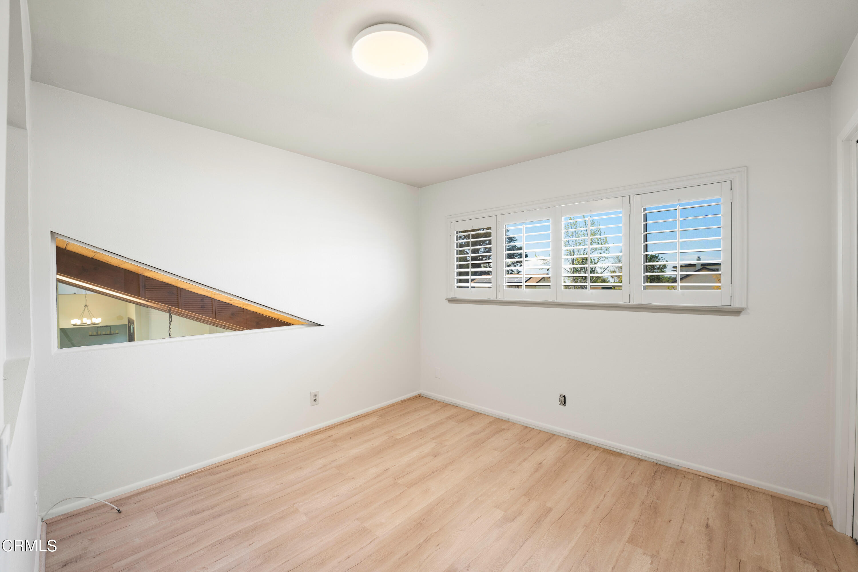 2210 Lyndhurst Avenue Camarillo, CA 93010 - Photo 27 of 37 a view of empty room with wooden floor