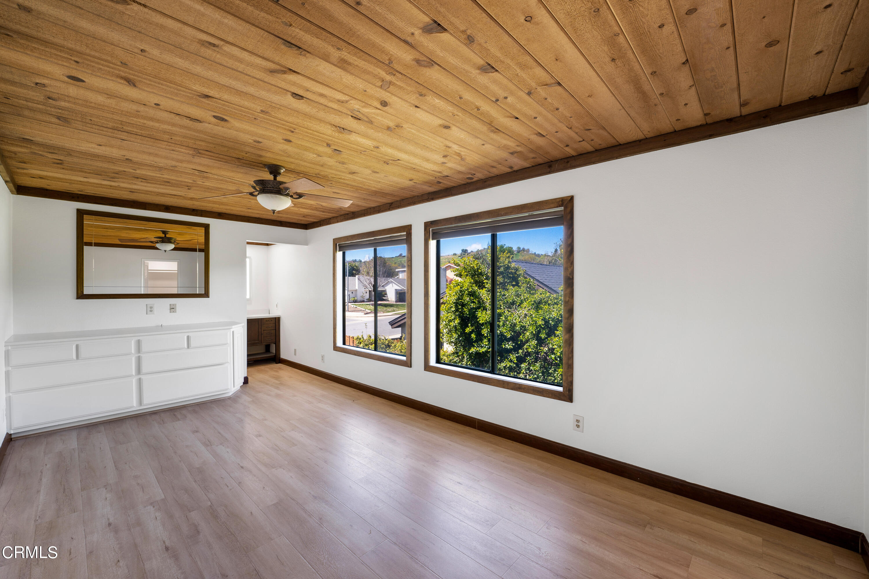 2210 Lyndhurst Avenue Camarillo, CA 93010 - Photo 28 of 37 a view of an empty room with a window and wooden floor