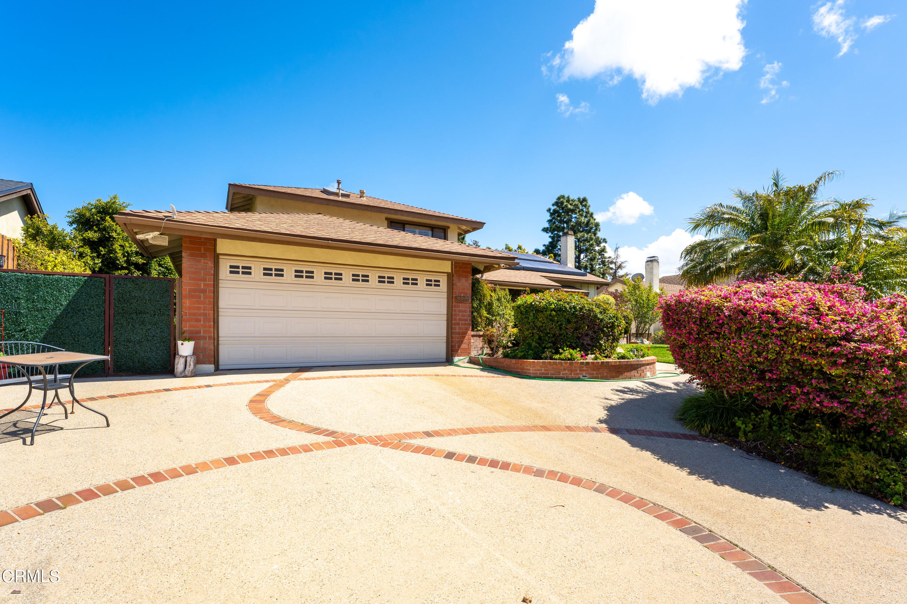 2210 Lyndhurst Avenue Camarillo, CA 93010 - Photo 3 of 37 a front view of a house with a yard
