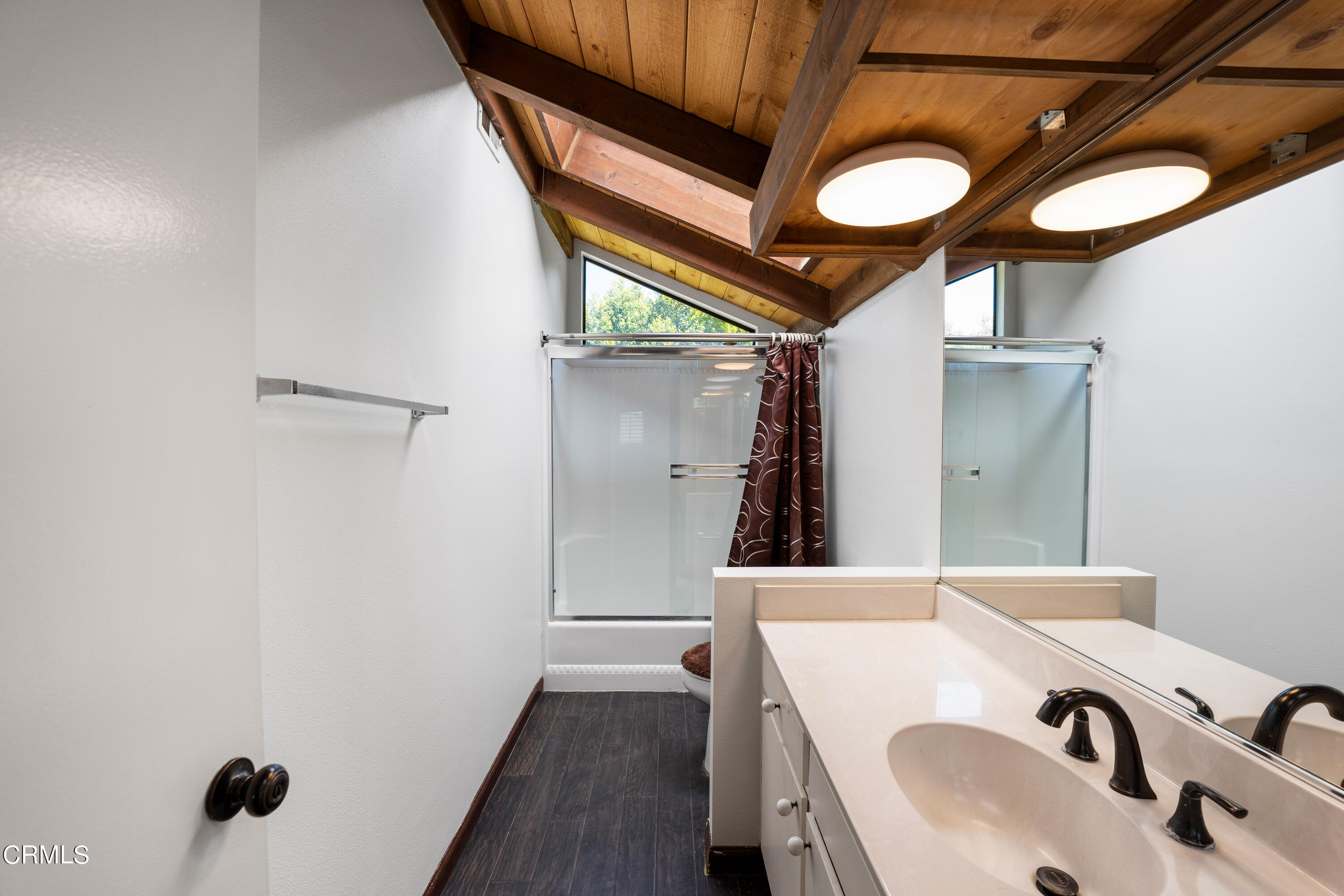 2210 Lyndhurst Avenue Camarillo, CA 93010 - Photo 31 of 37 a bathroom with a sink and a mirror