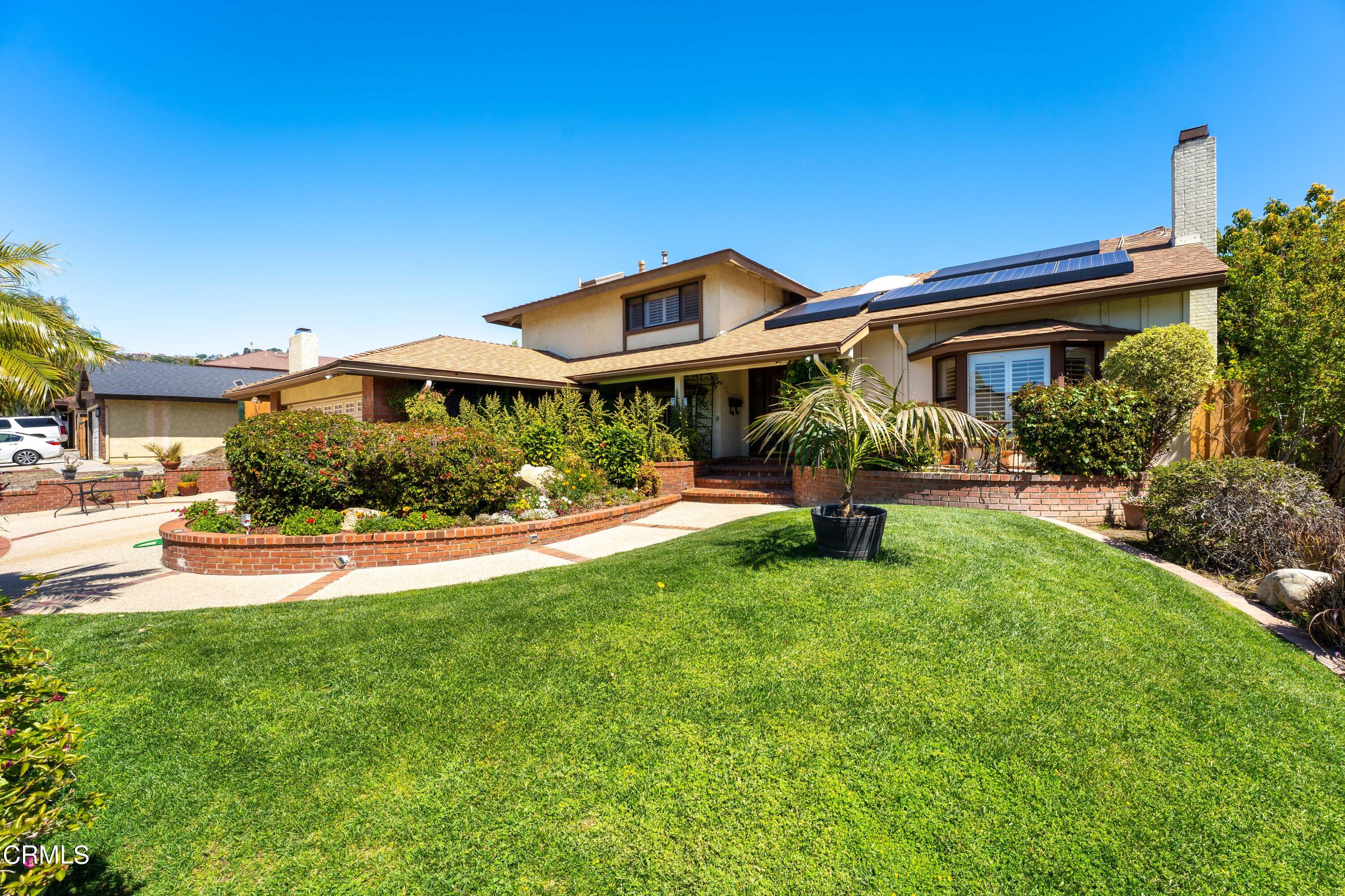 2210 Lyndhurst Avenue Camarillo, CA 93010 - Photo 5 of 37 a front view of a house with garden