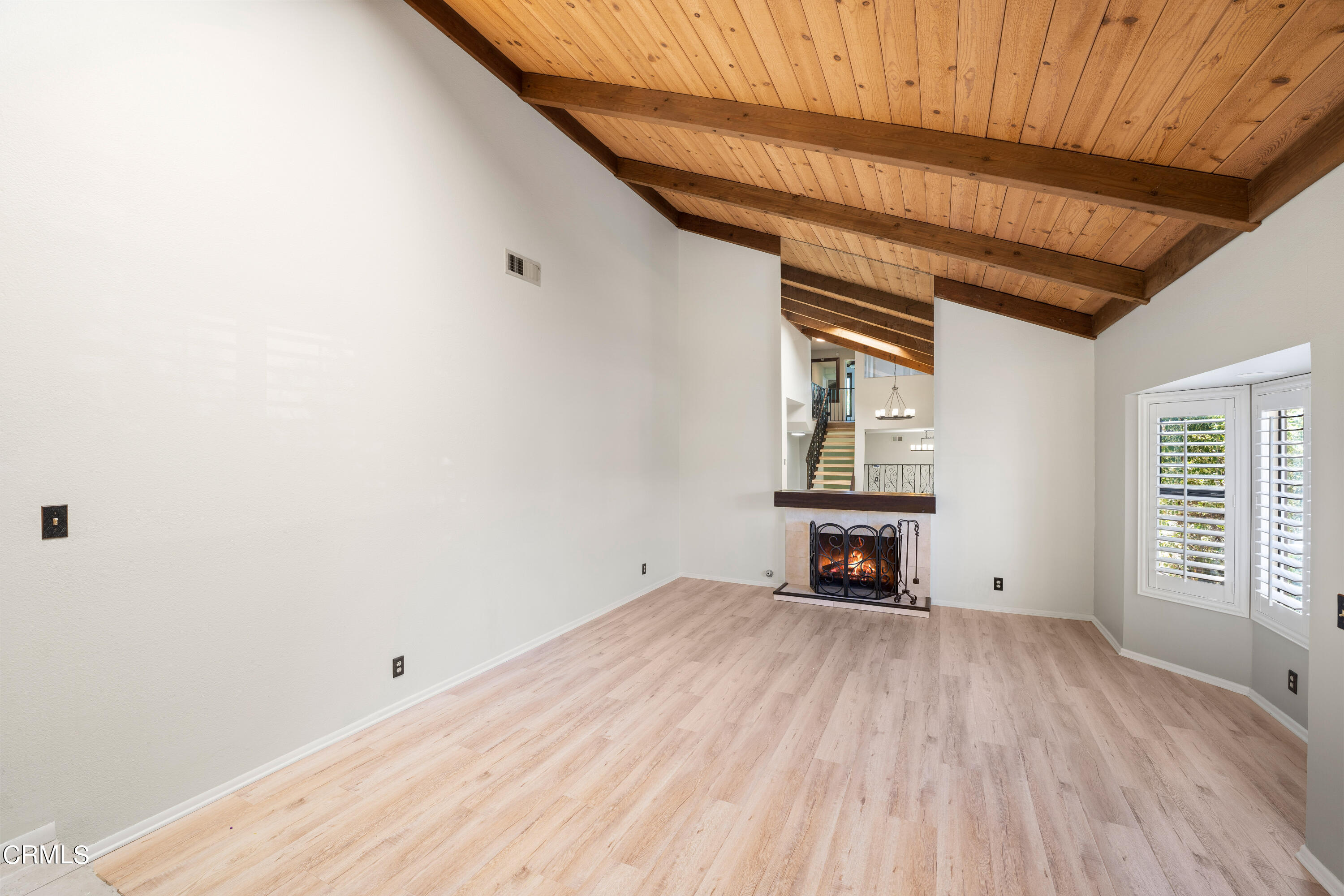 2210 Lyndhurst Avenue Camarillo, CA 93010 - Photo 9 of 37 a view of empty room with wooden floor and fan