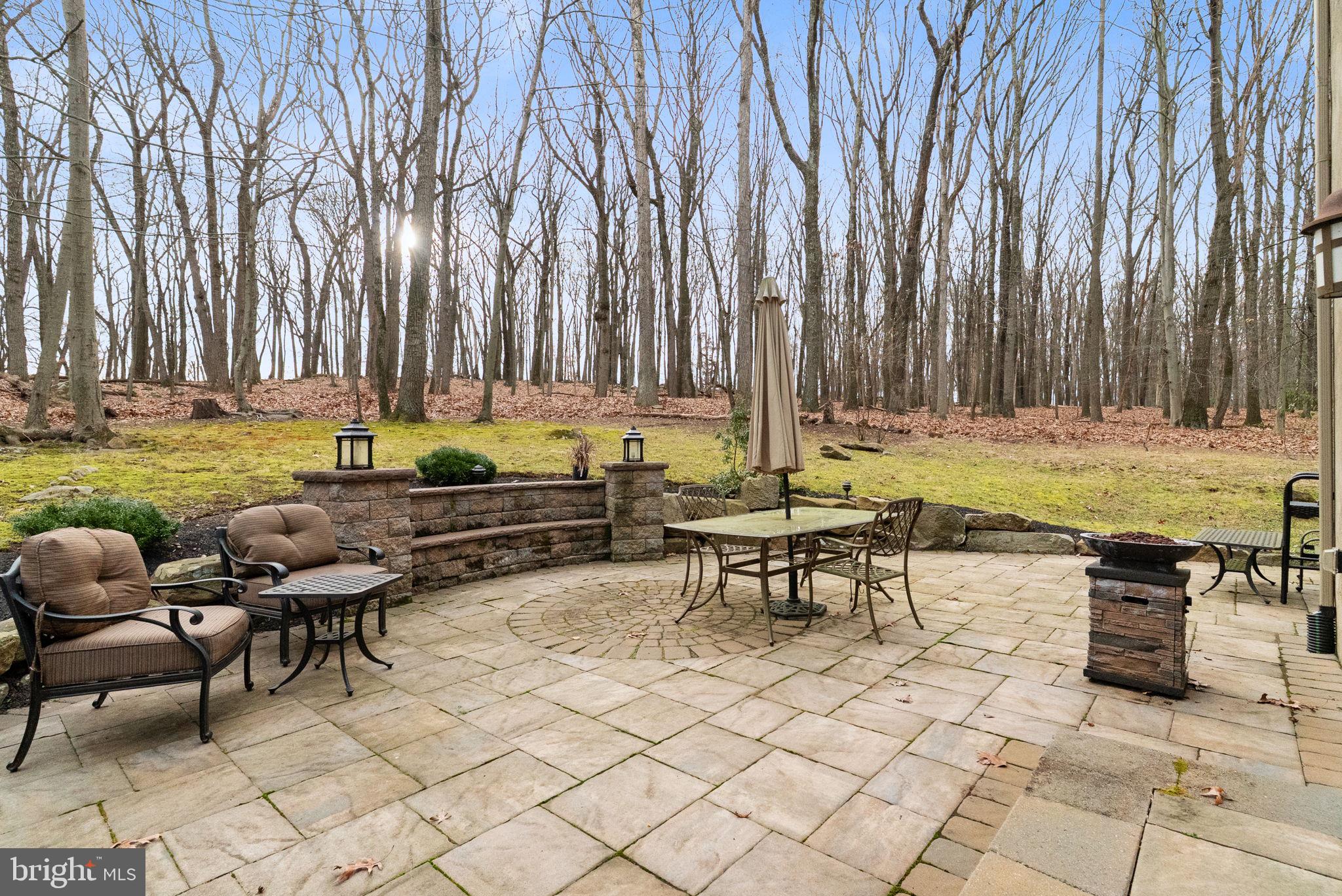 7044 Ely Road New Hope, PA 18938 - Photo 55 of 61 a view of a swimming pool and lounge chairs in back yard of the house