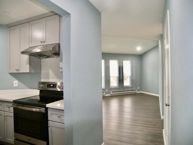 39470 Albany Common Fremont, CA 94538 - Photo 2 of 13 a kitchen with a stove and a refrigerator