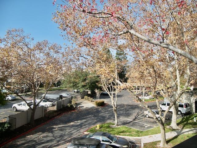 39470 Albany Common Fremont, CA 94538 - Photo 10 of 13 a couple of cars parked in front of a yard