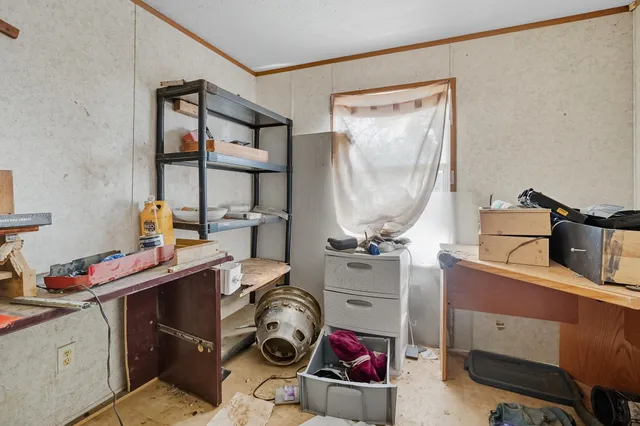 a room with a storage and utility