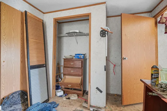 a view of a house with a snow in a yard