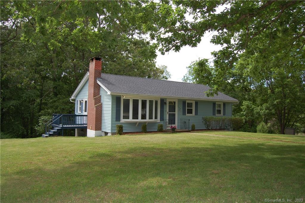 160 Hansen Road Norwich, CT 06360 - Photo 1 of 1 a view of a house next to a big yard with large trees