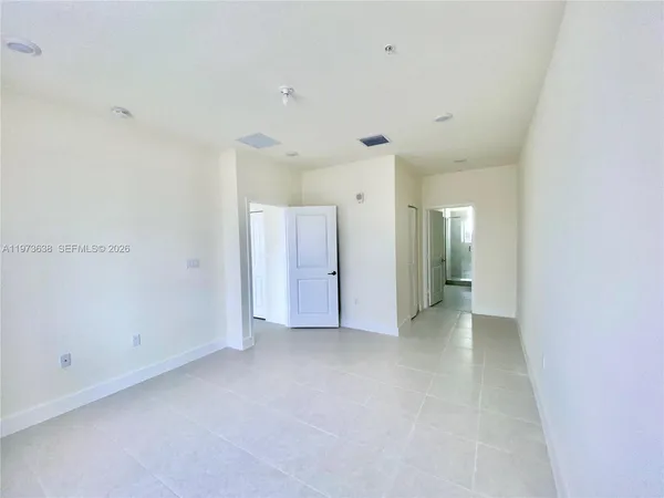 a bathroom with a bathtub and a sink