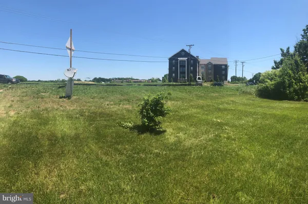 a house view with garden space