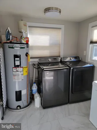a kitchen with a stove and a refrigerator