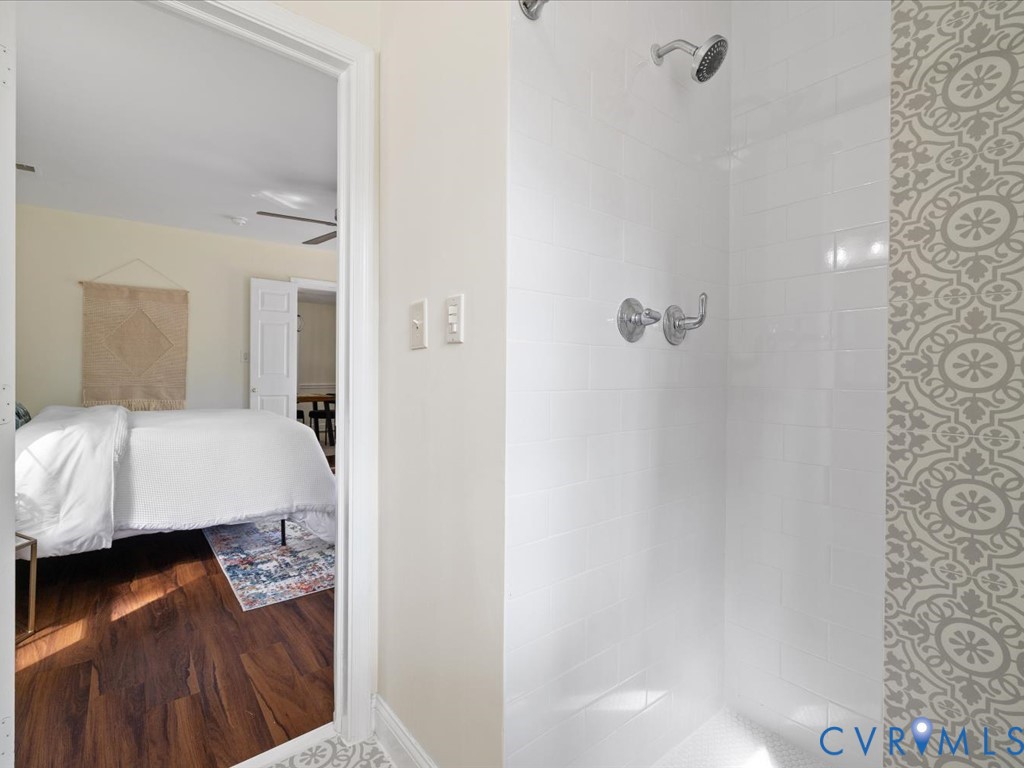 4803 Morrison Road Richmond, VA 23230 - Photo 26 of 45 a bedroom with a bed and a table
