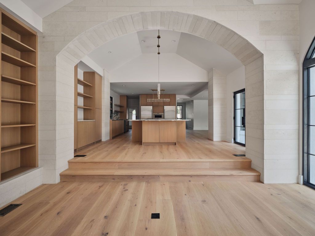 13 Niles Road Austin, TX 78703 - Photo 11 of 40 a large white bed in a white room