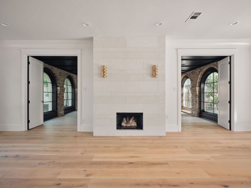 13 Niles Road Austin, TX 78703 - Photo 19 of 40 a view of livingroom and hallway with wooden floor