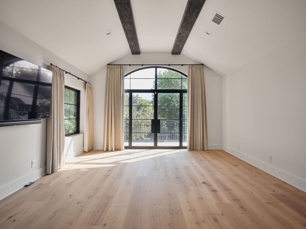 13 Niles Road Austin, TX 78703 - Photo 25 of 40 a view of an entryway with a floor to ceiling window and a kitchen