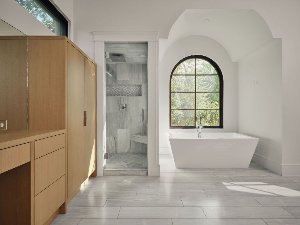 13 Niles Road Austin, TX 78703 - Photo 29 of 40 a spacious bathroom with a bathtub and a shower