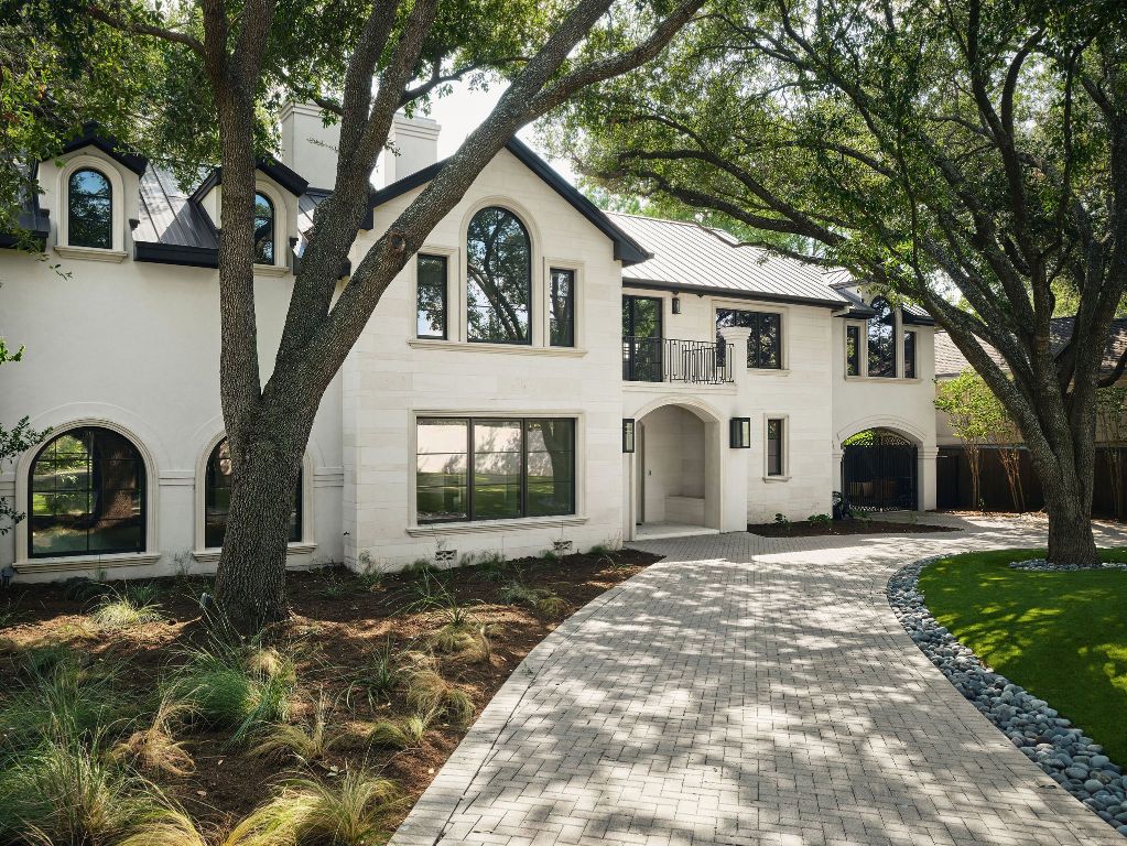 13 Niles Road Austin, TX 78703 - Photo 4 of 40 a view of a white house with a large tree