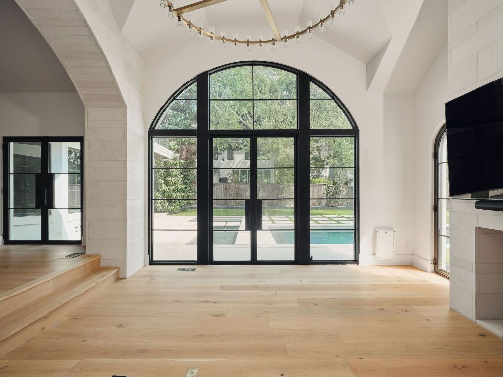 13 Niles Road Austin, TX 78703 - Photo 8 of 40 a view of an entryway with a floor to ceiling window and a flat screen tv
